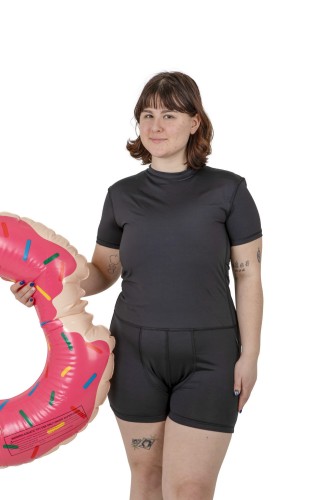 Black one-piece swimsuit with short sleeves and back zipper, surfwear-inspired design